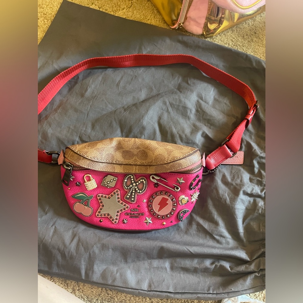 Coach signature print/hot pink charms bag